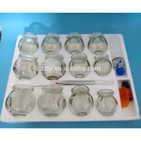 Group of Glass Cupping Jar Set with Scrapes the skin the board,Tweezers,Essential oil,Fire rod and Alcohol burner